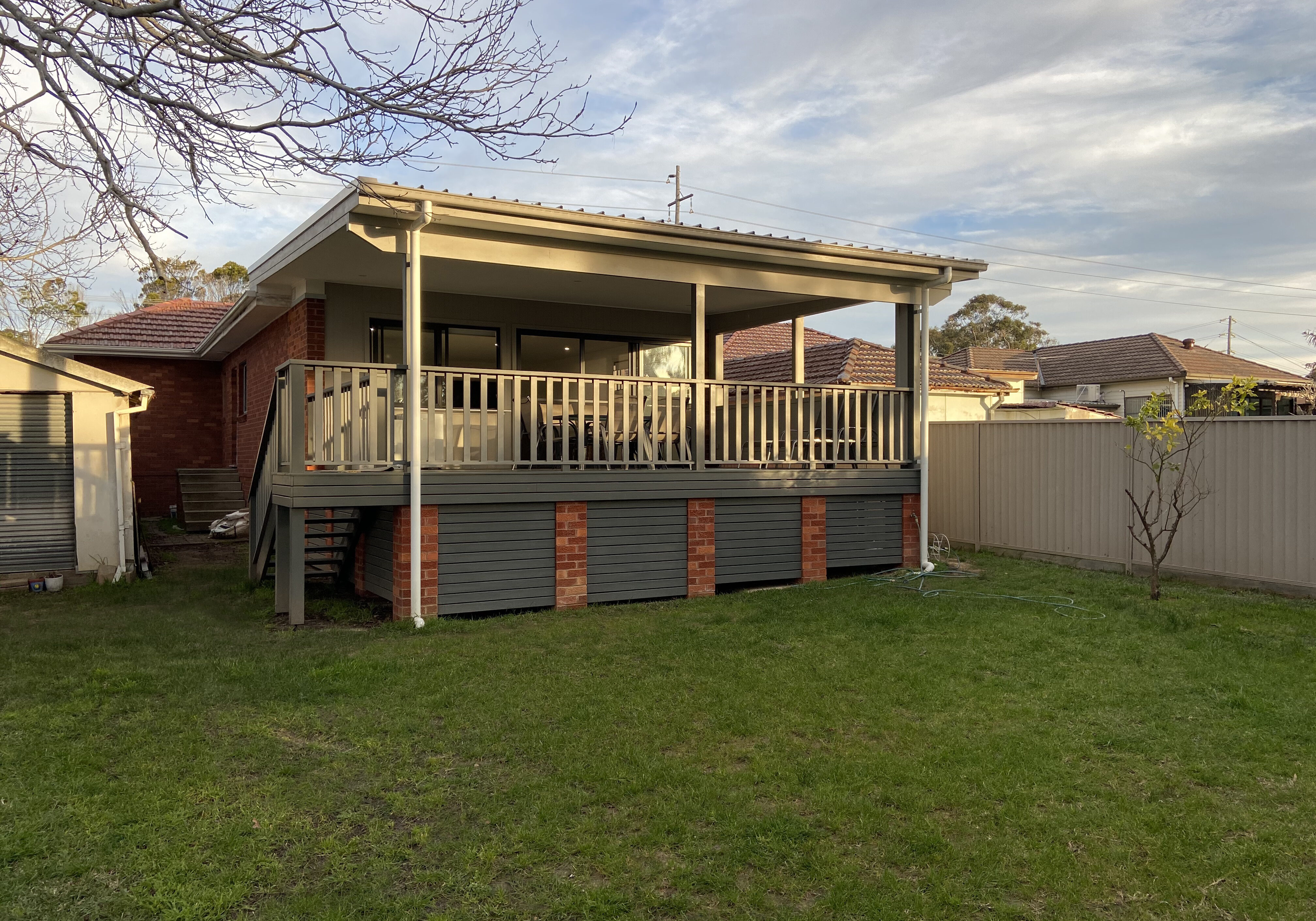 An outdoor kitchen with built-in BBQ and bar fridge (so you're not running back and forth to your inside kitchen while entertaining)